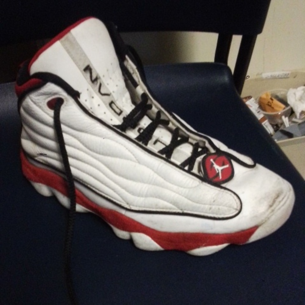 Red and white Jordan sneakers, size 11
